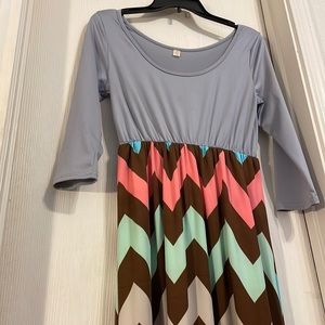 Super cute maxi dress! Gray top and Chevron print skirt with multi colors.